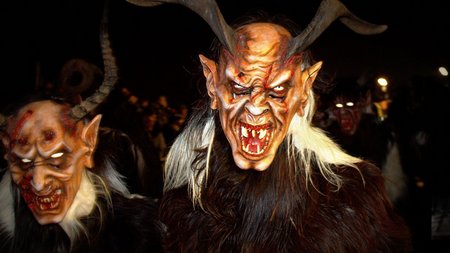 The eco-friendly way to enjoy South Tyrol People wearing scary Krampus costumes at night