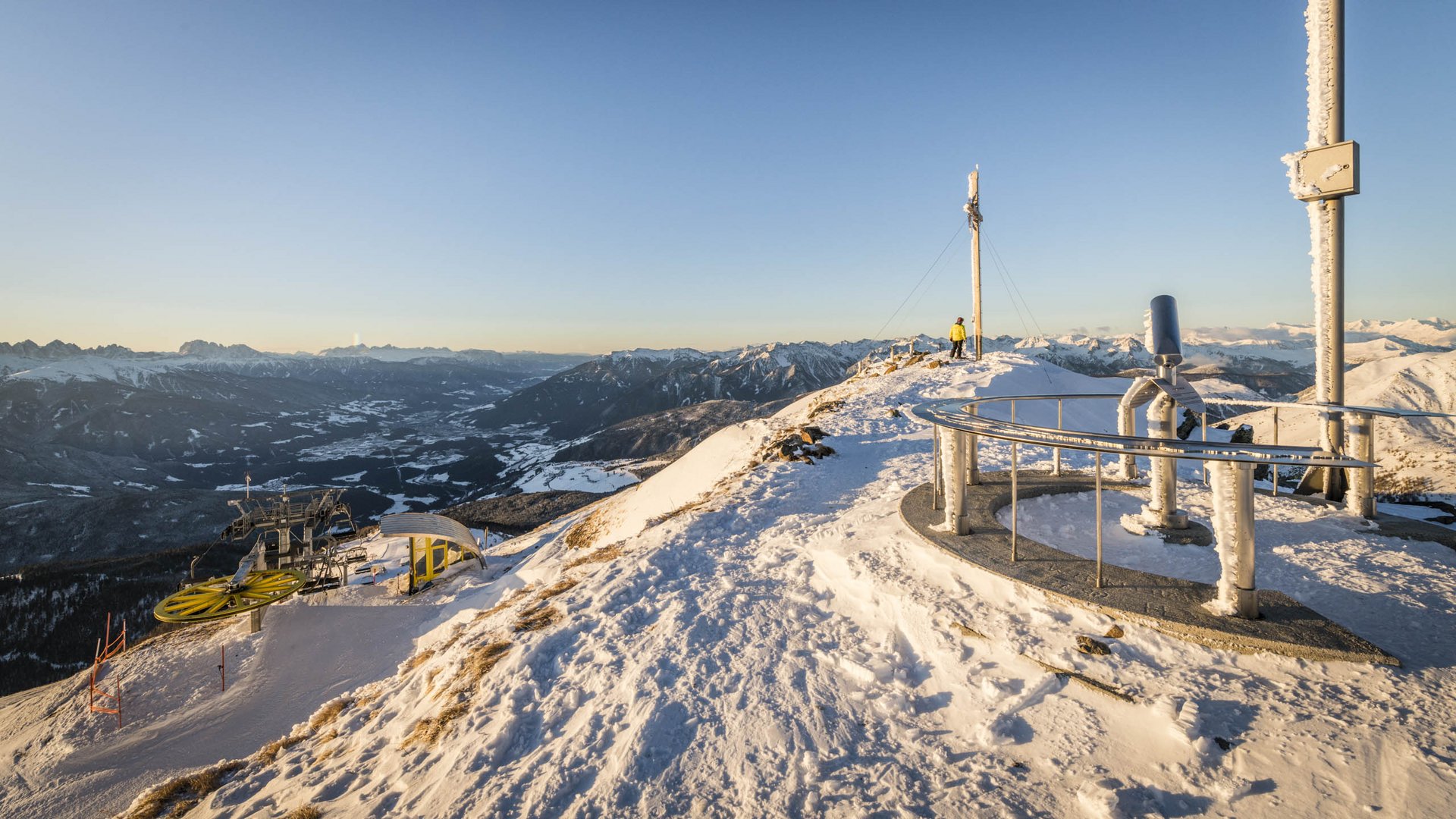 The Gitschberg panoramic platform in Meransen, Italy Snowy mountain peak with chairlift and panoramic mountain view