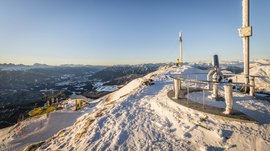 The Gitschberg panoramic platform in Meransen, Italy Snowy mountain peak with chairlift and panoramic mountain view