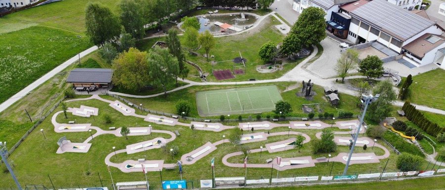 The Gitschberg webcams Aerial view of a miniature golf course and nearby buildings in a village